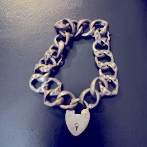 Vintage charm bracelet with heart padlock